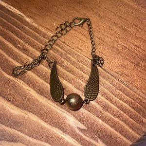 Harry Potter golden snitch bracelet
Any questions just let us know